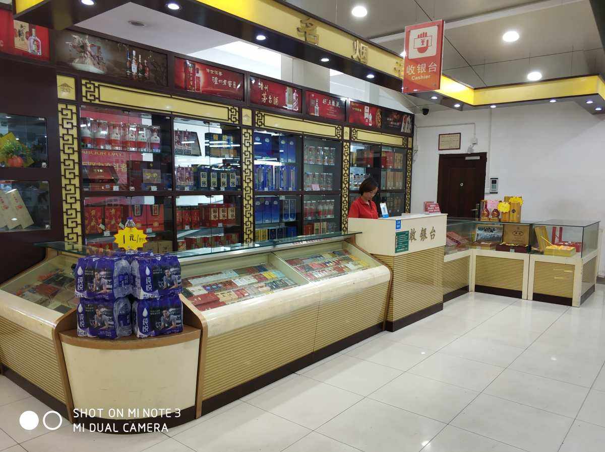 烟酒店柜子图片大全(烟酒店柜台设计效果图)